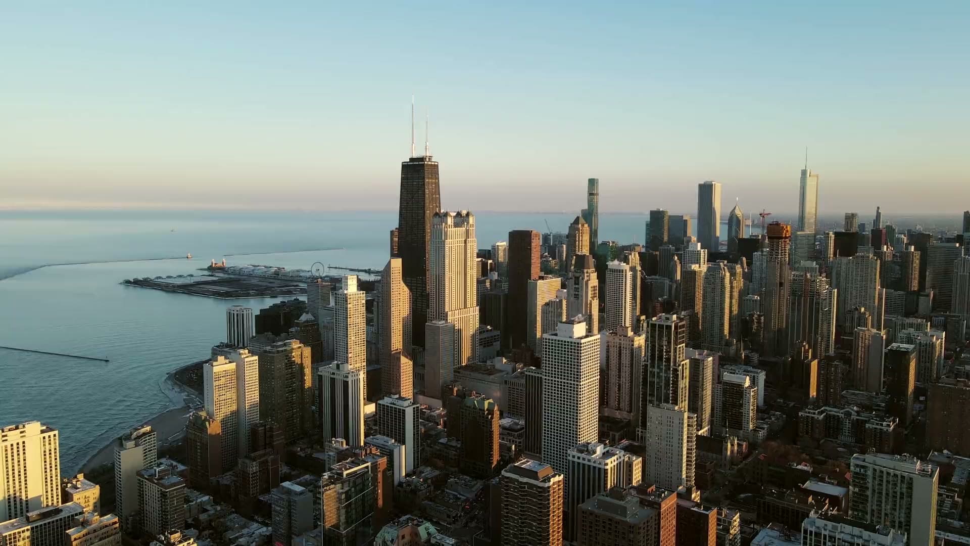 Chicago skyline at sunset - Sync Properties LLC serves the greater Chicagoland area